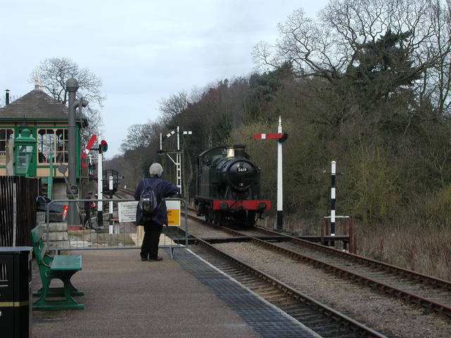 Waiting for steam engine 5619 to couple up to the coaches to make the return trip to Sheringham from Holt 

