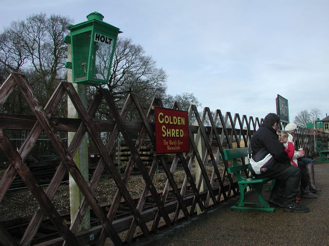 Passengers waiting at the platform
