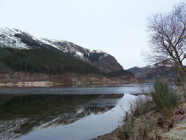 Loch Lubnaig, partially frozen loch gives a fractured reflection
